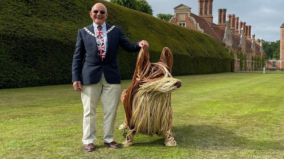 Corgi with John Fisher, chairman of the council