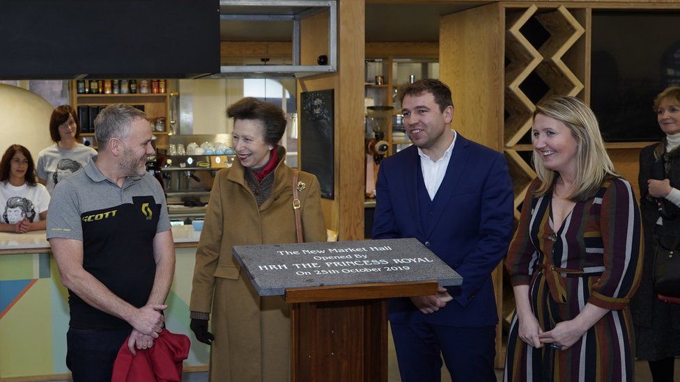 The Princess Royal unveiling a plaque at the Market Hall in Douglas