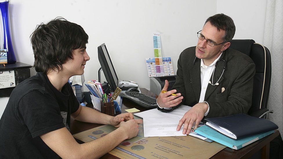 Doctor and patient sitting down