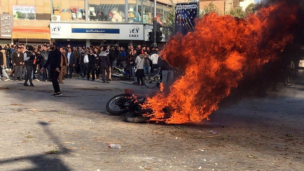 Iranian protesters in the streets following fuel price increase in the city of Isfahan, central Iran, 16 November 2019