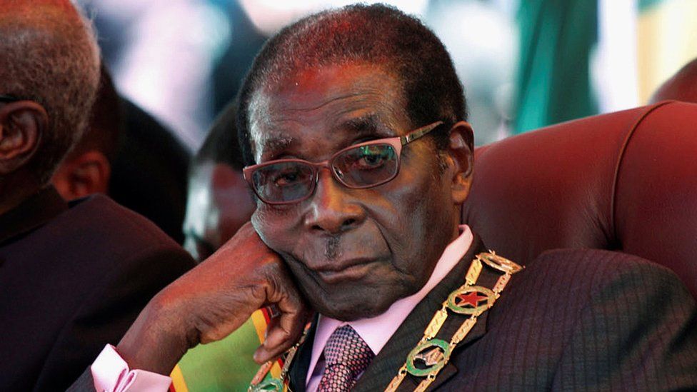 Robert Mugabe looks on during a rally marking Zimbabwe"s 32nd independence anniversary celebrations in Harare, Zimbabwe April 18, 2012.