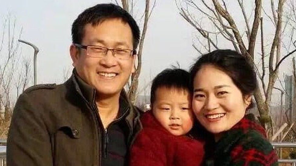 Wang Quanzhang, his wife Li Wenzu and their child