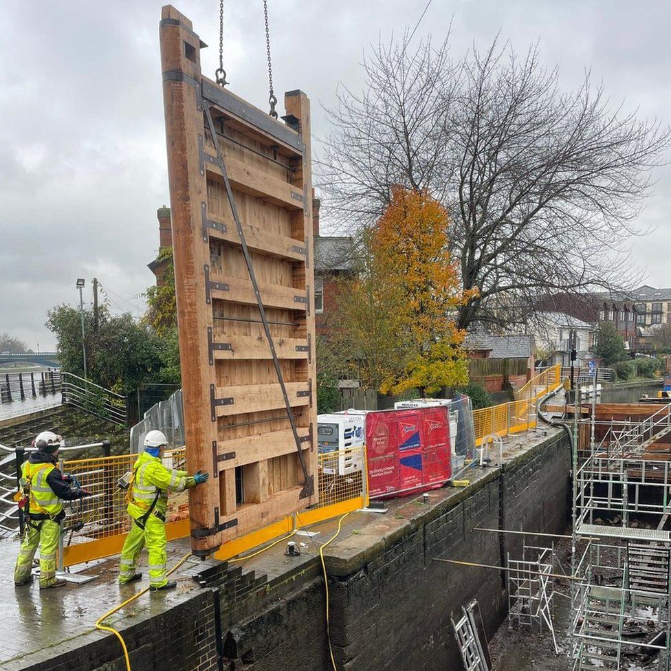 One of the lock gates being lifted into place