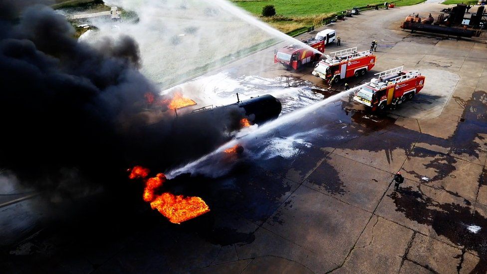 Firefighters tackling a fire