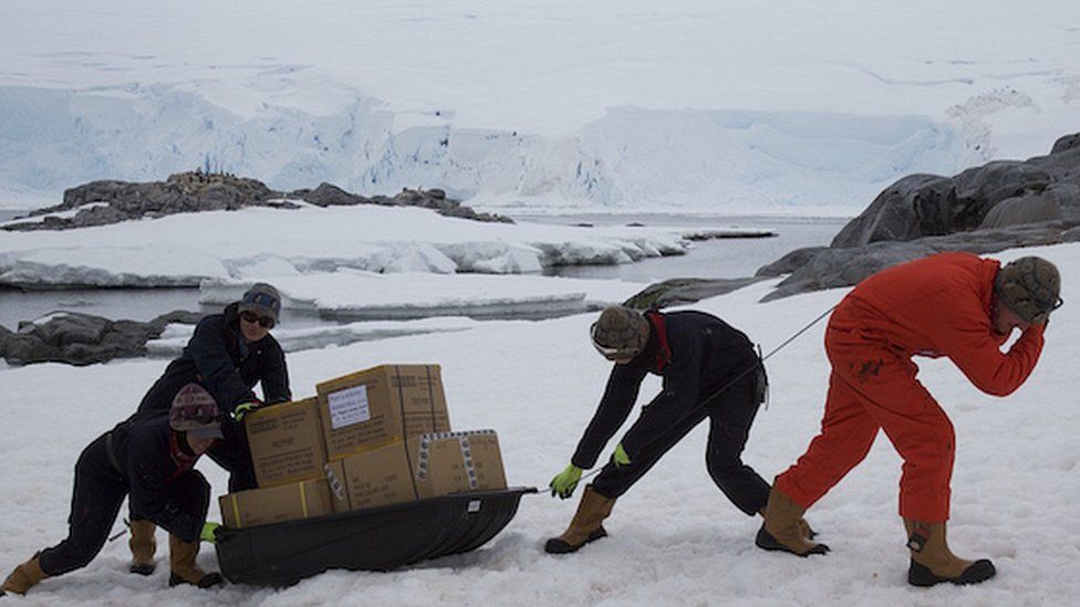 Supplies being carried to Port Lockroy