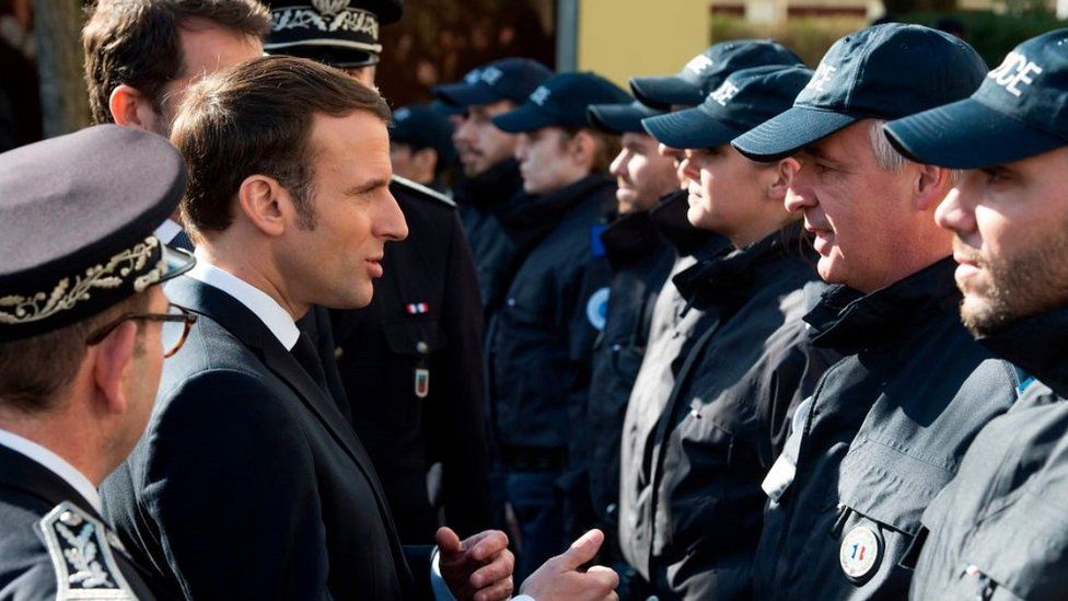 President Macron with police, 18 Feb 20