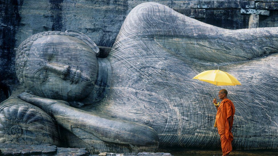 A Buddhist monk at the Gal Vihara in Sri Lanka