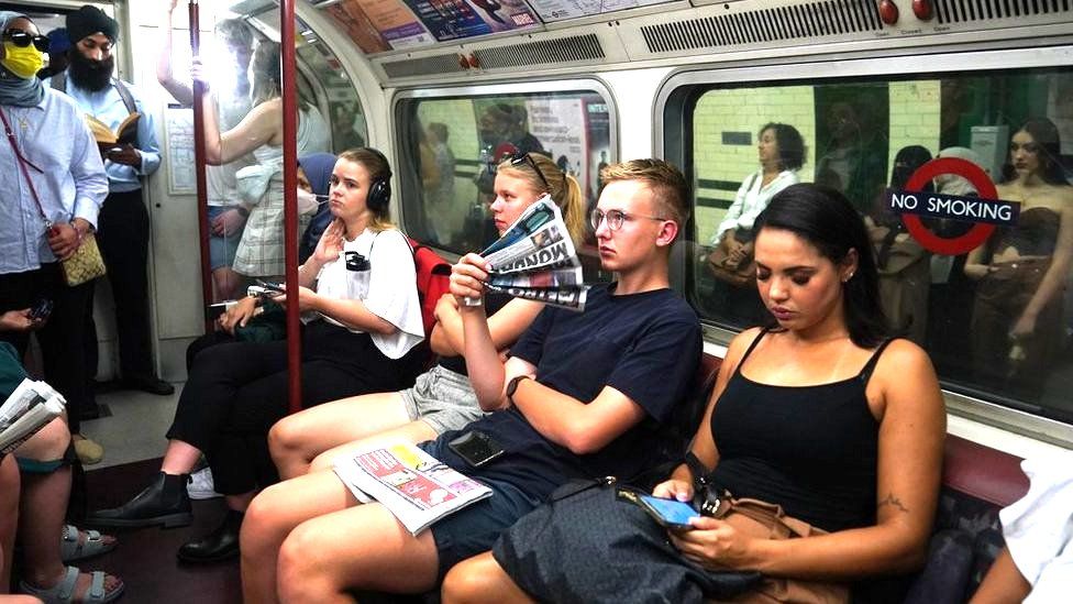 people sweltering on underground