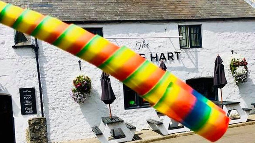 A rainbow decoration outside a pub in Llantwit Major