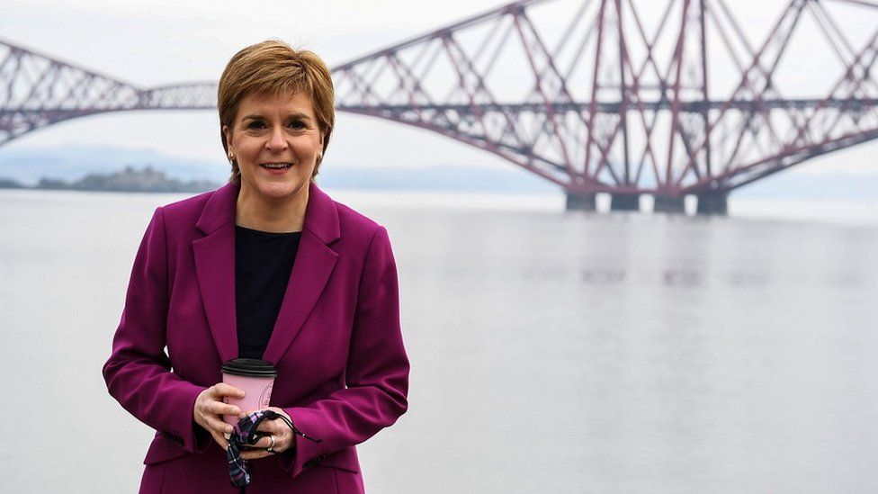 SNP leader Nicola Sturgeon stands in front of the Forth Bridge