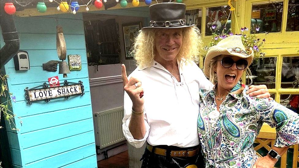 Steve Cassini and his wife Sheba outside their home on Eel Pie Island
