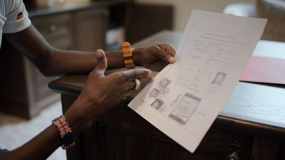 Mo Farah showing a scan of the travel document used to bring him to the UK