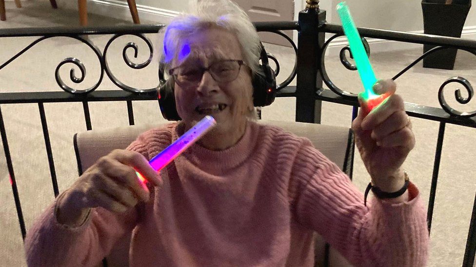 Residents with glow sticks