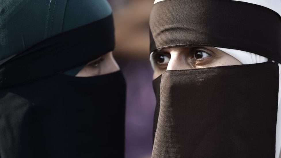 Women wearing a face veil