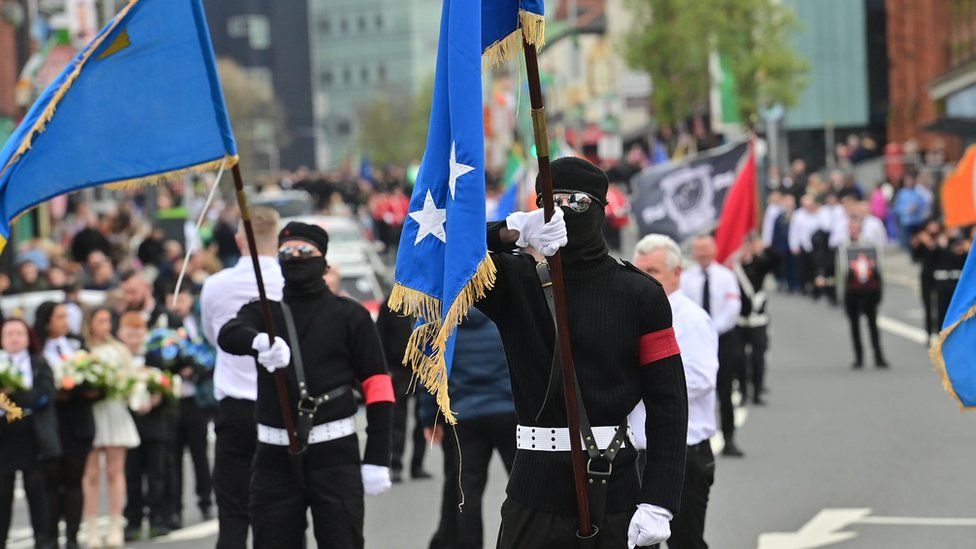 Masked men march in west Belfast Easter Parade
