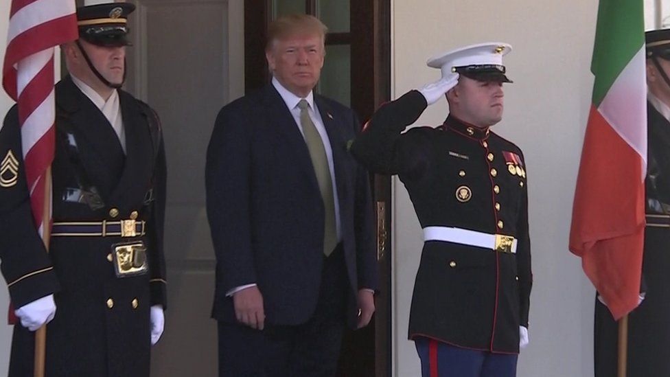 President Trump preparing to greet the Taoiseach at the White House