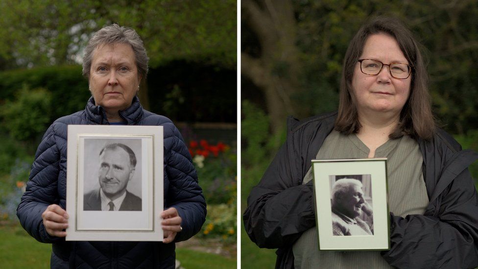 Dr Cathy Gardner and Fay Harris with pictures of their fathers