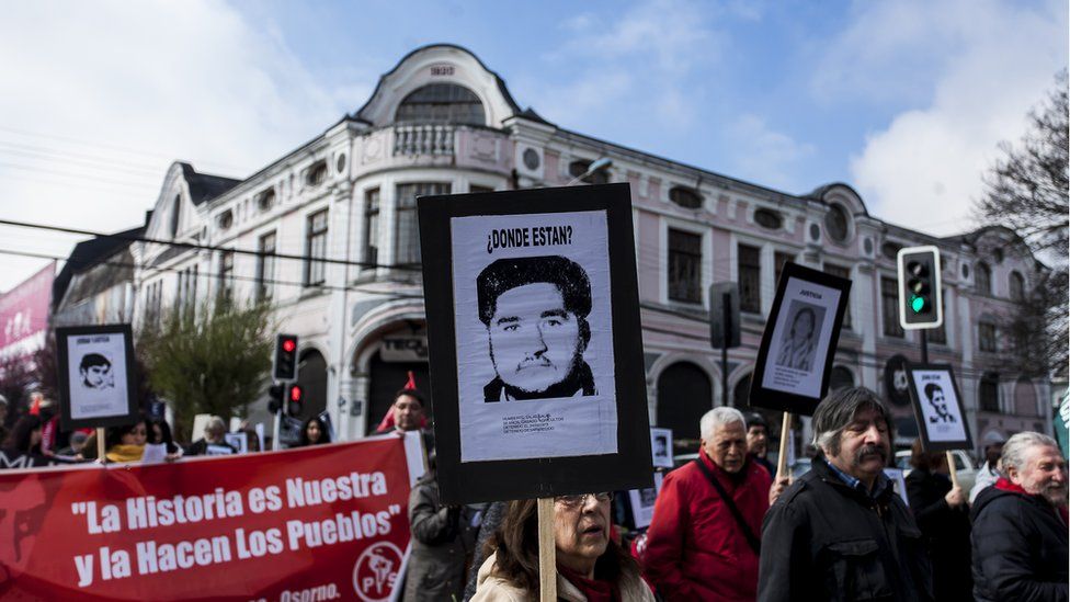 Relatives of disappeared and executed political prisoners commemorate the 45th anniversary of the coup against Salvador Allende in Osorno, Chile. 11 September 2018