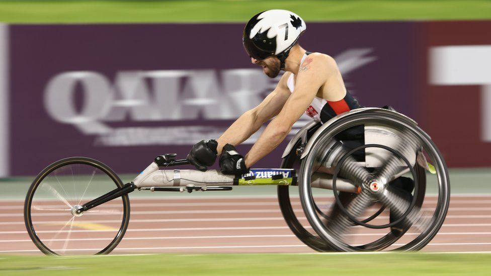 Paralympian 'dragged self' from Qatar Airways flight - BBC News