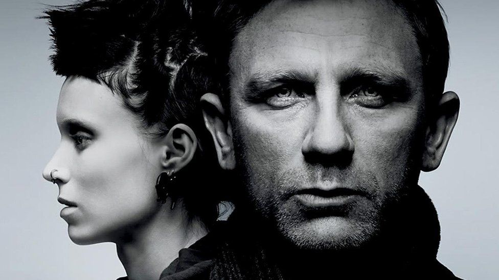 Daniel Craig and Rooney Mara in black and white promotional image for The Girl with the Dragon Tattoo