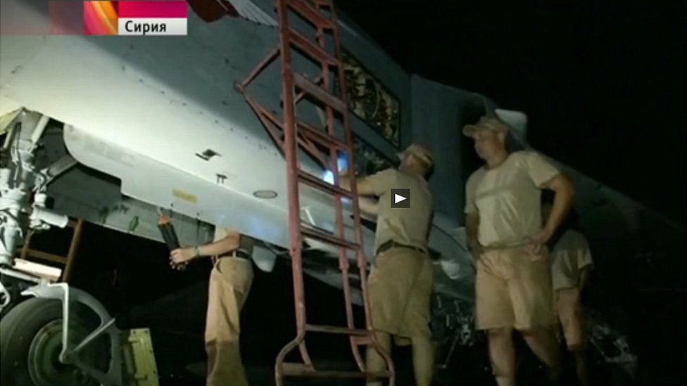 Russian air crew maintaining jet in Syria - Russian Channel One TV, 1 Oct 15