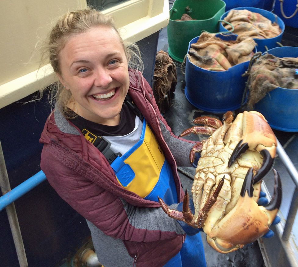 Polly Weston holding a crab