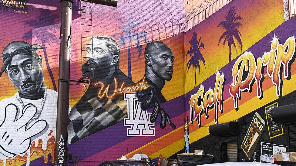 A mural of Tupac Shakur, Nipsey Hussle and Kobe Bryant