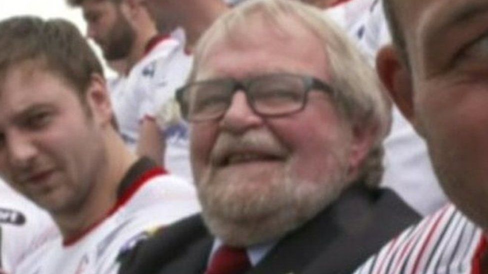 Graffin Parke, pictured in suit, with the Ulster Rugby team in 2017
