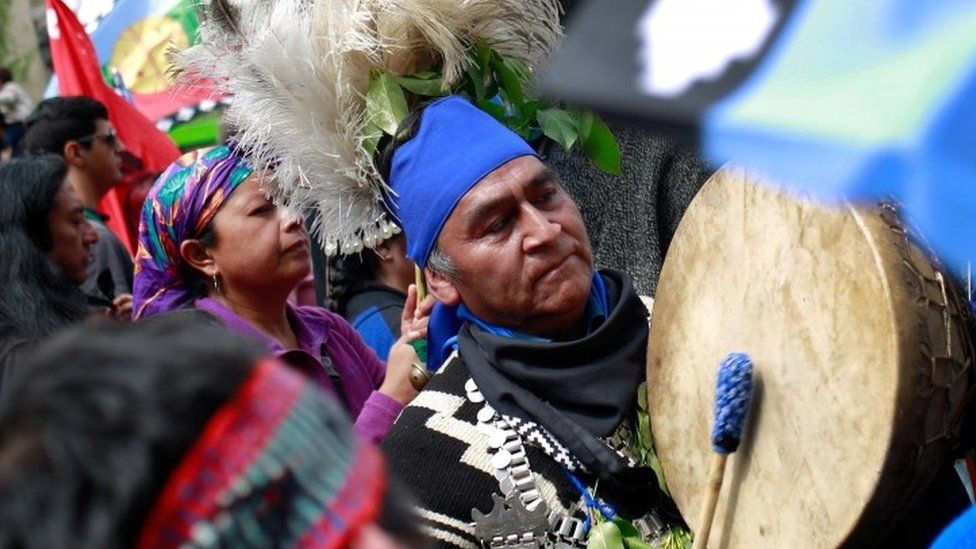 Mapuche Indian activists take part in a rally against Columbus Day in downtown Santiago, Chile October 9, 2017.