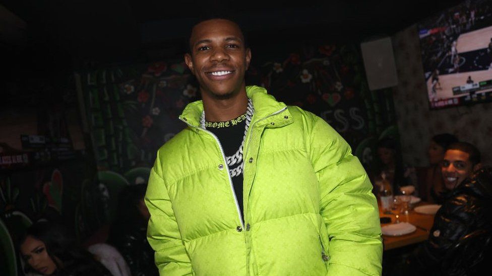 A Boogie Wit Da Hoodie wearing a fluorescent jacket during his birthday celebration in 2023