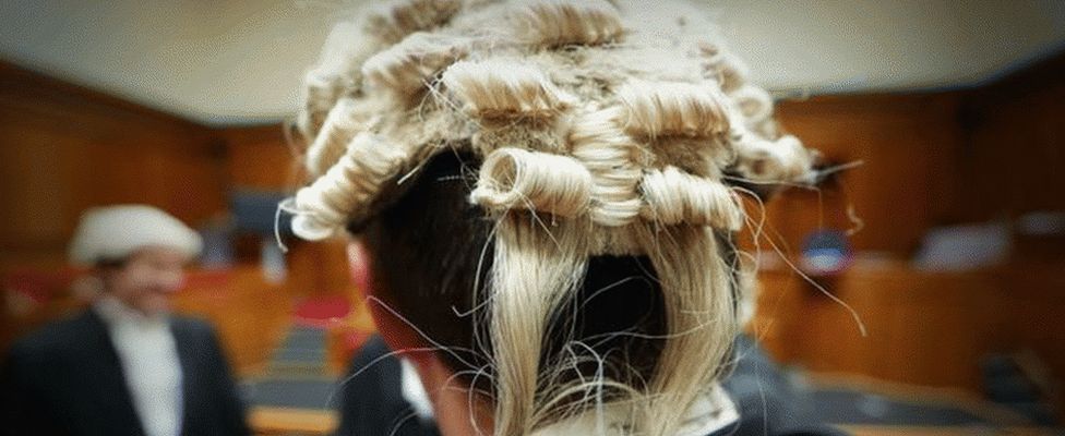 Bewigged lawyers in court