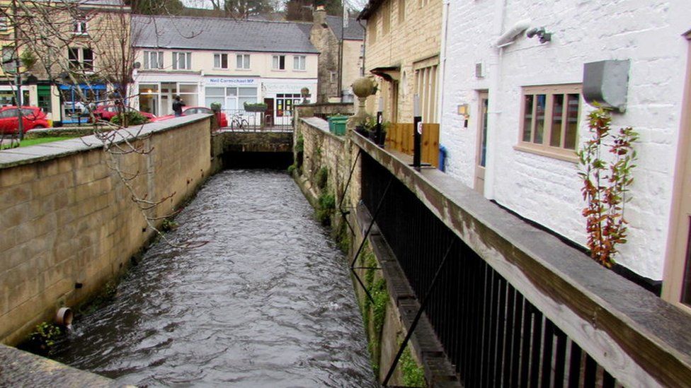 Stream running under town centre