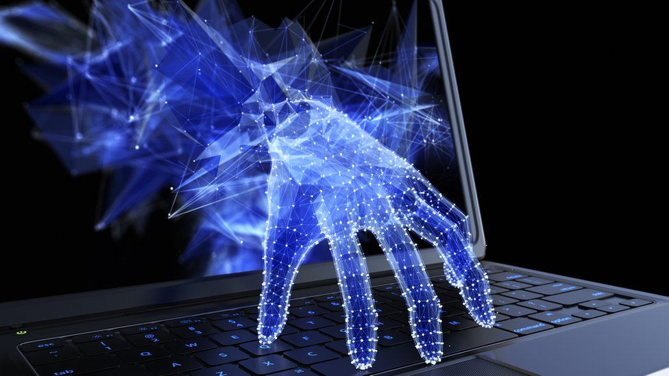 Graphic of hand coming through a laptop