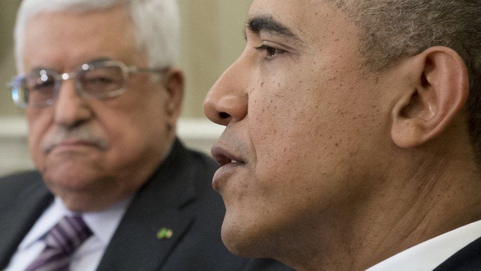 File picture of Mahmoud Abbas speaking to Barack Obama