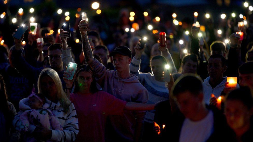 Hundreds attended a candlelit vigil in memory of the victims of the shooting