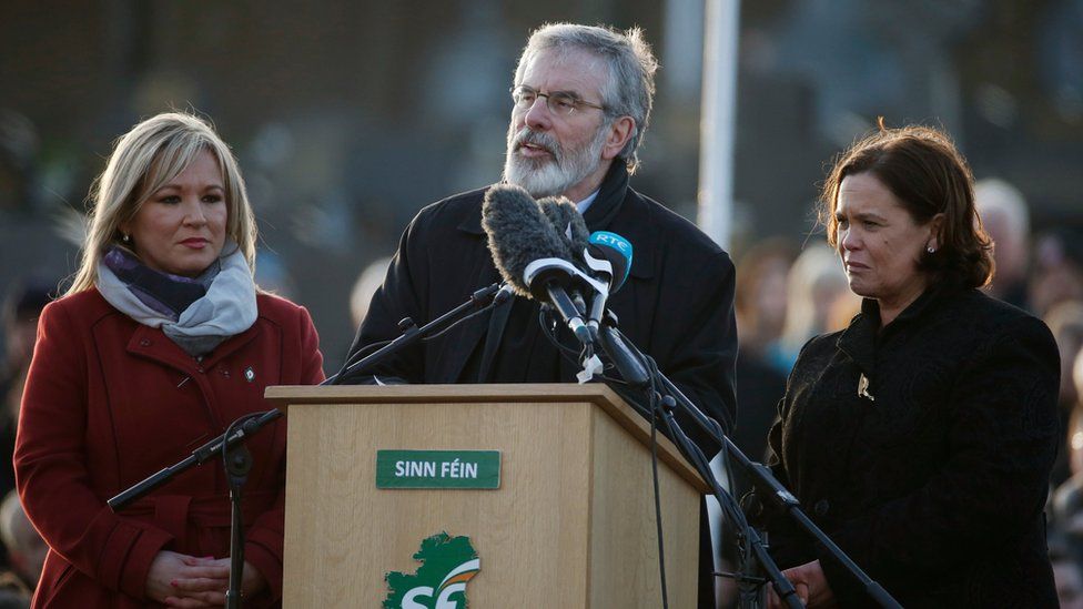Sinn Féin Gerry Adams speaks as Michelle O'Neill, left, and Mary Lou McDonald, right, look on