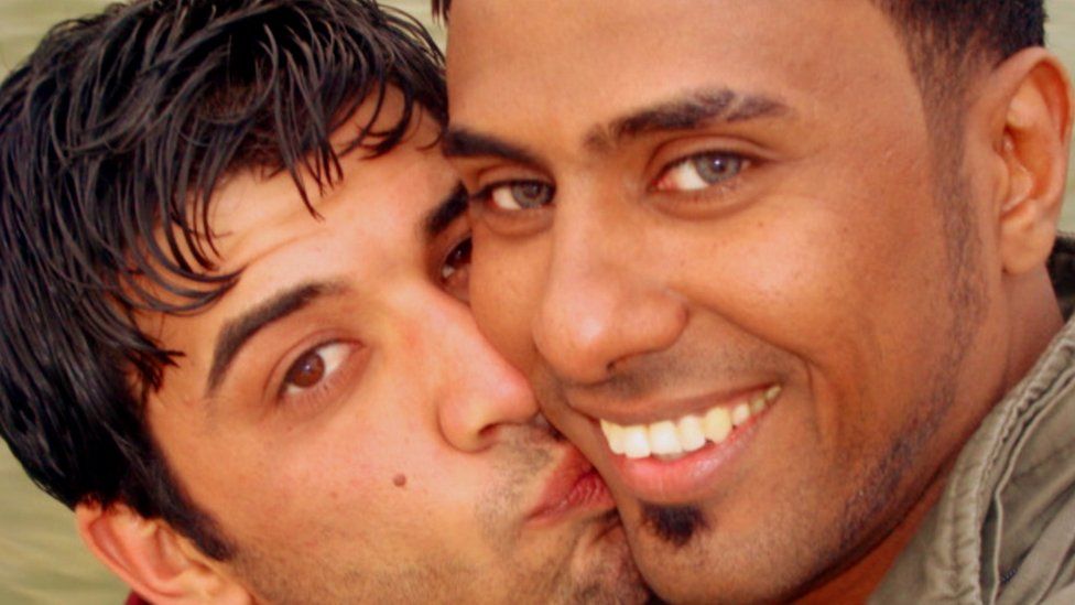 Btoo Allami (left) kisses Nayyef Hrebid on the cheek