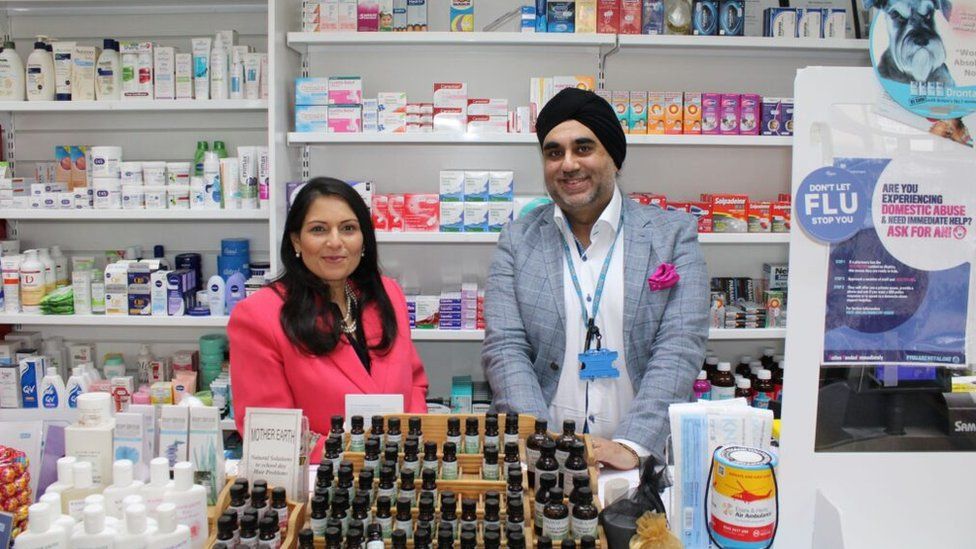 Priti Patel and Dimple Bhatia inside the Tollesbury Pharmacy