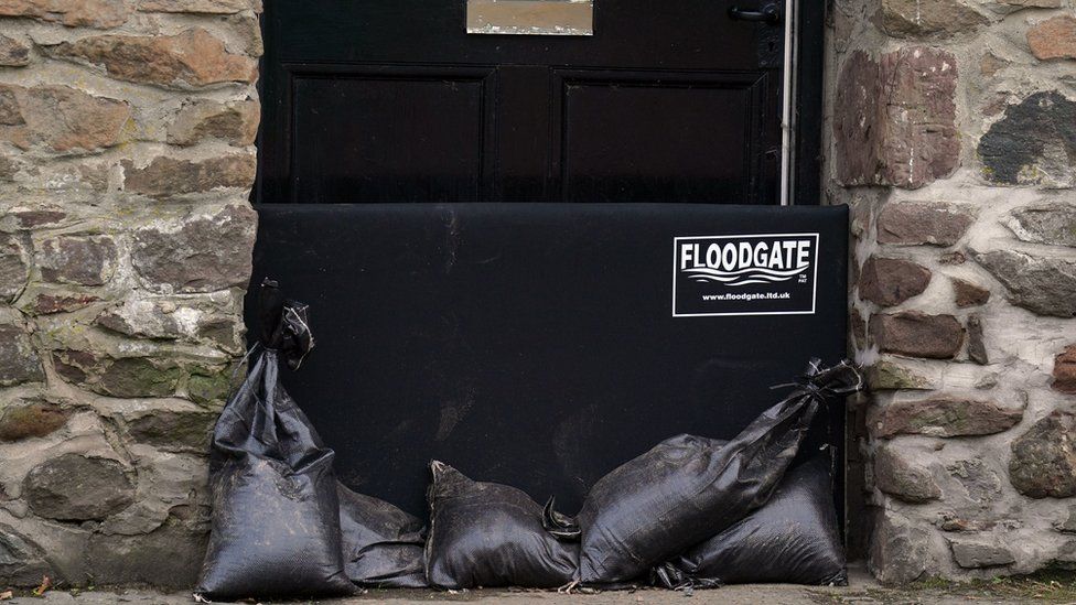 Floodgate on door of house in Scotland