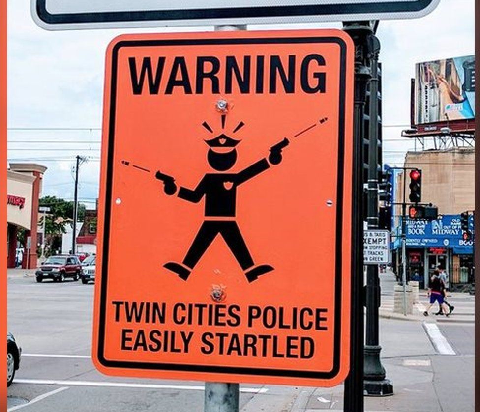 sign mocking police