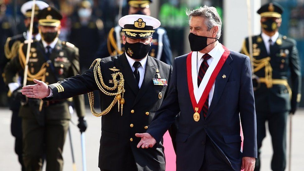 Francisco Sagasti appears at his inauguration, wearing a face mask