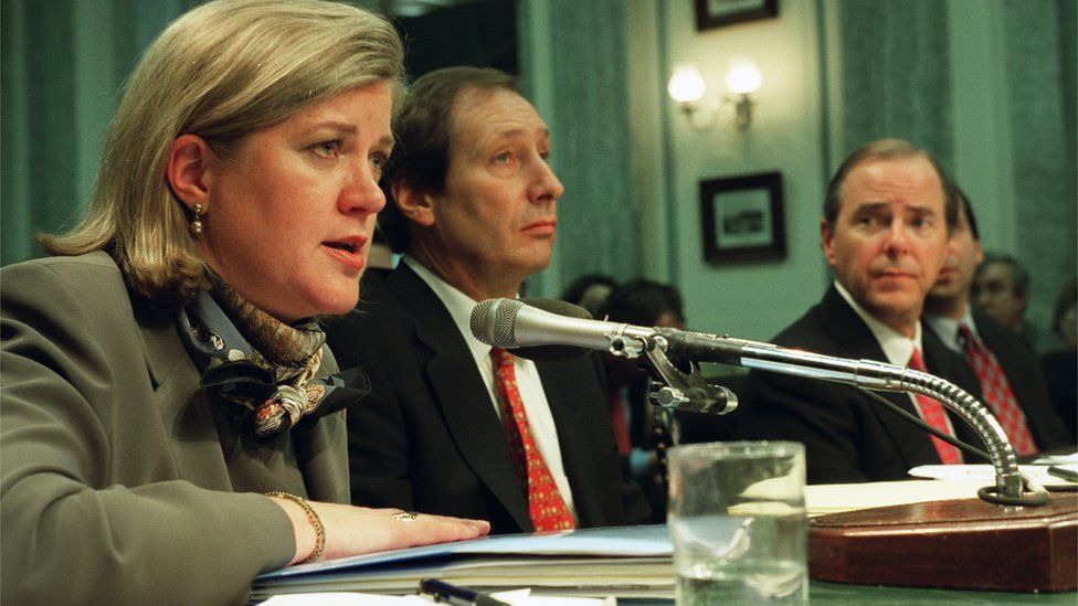 Sherron Watkins, vice president of Corporate Development for the Enron Corporation, Skilling attorney Bruce Hiler, and Jeffrey Skilling, former CEO of Enron, during the Senate Commerce hearing on the the company's bankruptcy. 26 February 2002