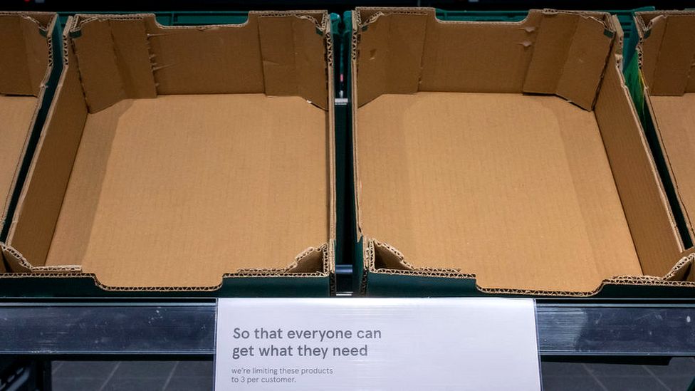 Empty fresh produce boxes in a UK supermarket
