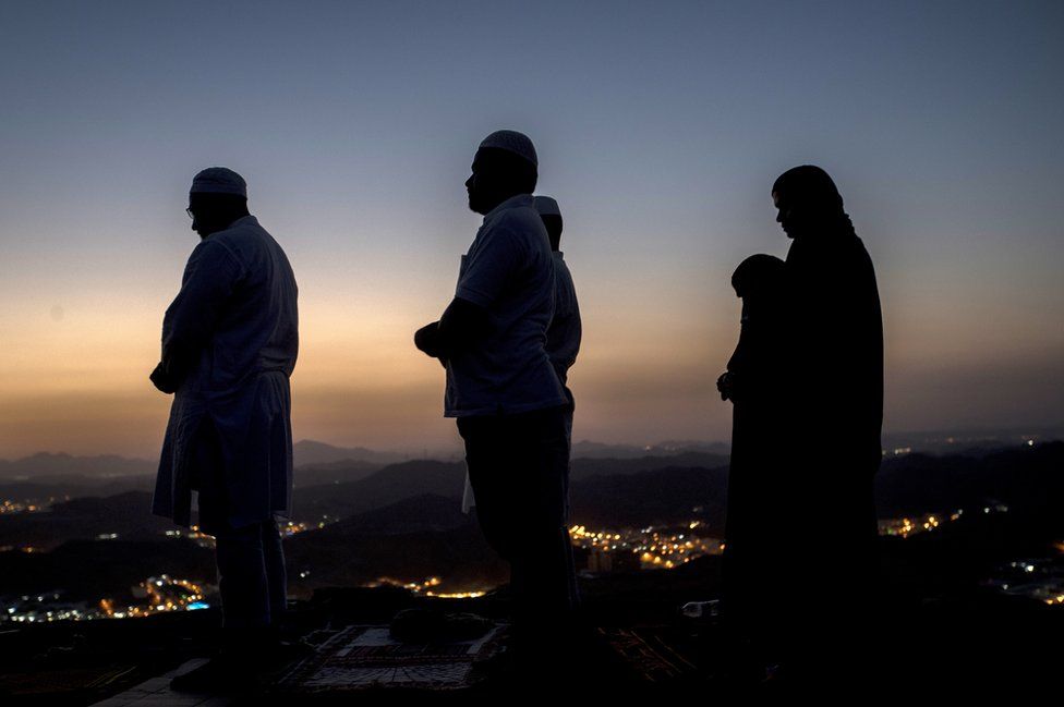 Muslim Hajj pilgrims pray at the Jabal al-Nour (al-Noor mountain) during the annual Hajj pilgrimage in Mecca, Saudi Arabia, 15 August 2018.