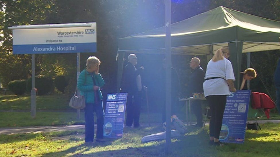 Campaigners petitioning outside the Alexandra Hospital on 22 October