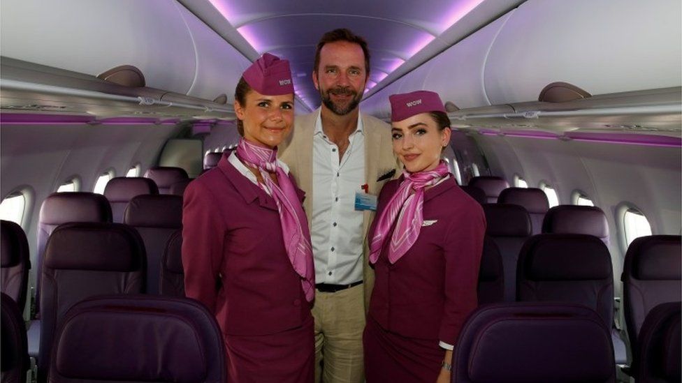 Founder of Wow Air and chief executive Skuli Mogensen with cabin crew