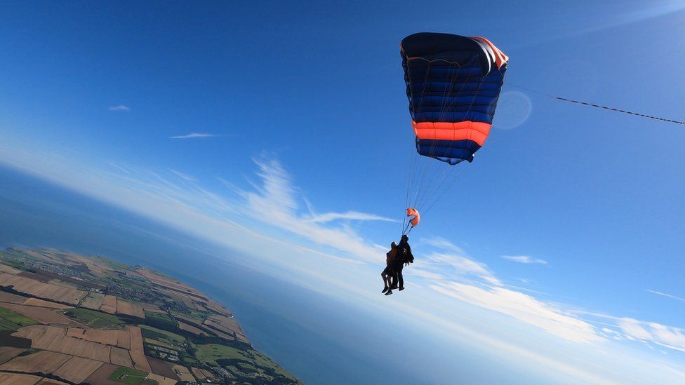 George Mattinson in the sky mid skydive