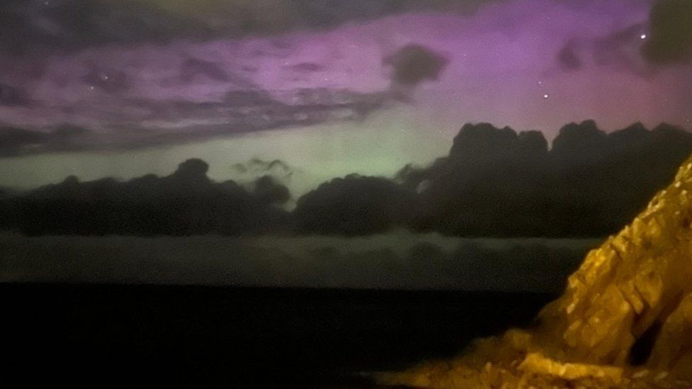 Skies lit up purple over Peel, Isle of Man