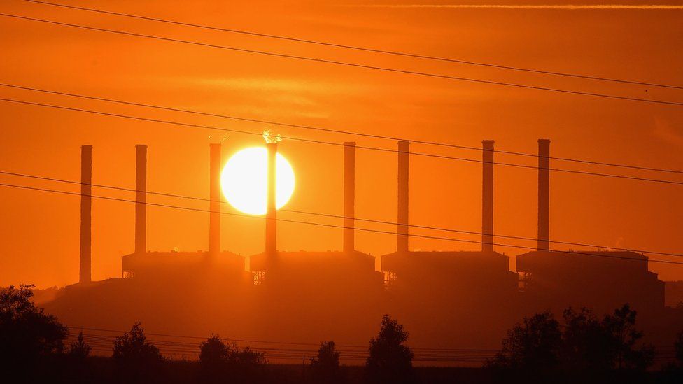 Sun setting over Hazelwood coal station in Australian state of Victoria in 2017