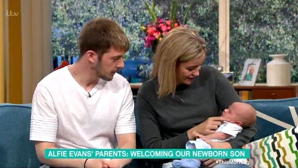 Tom Evans and Kate James with baby Thomas